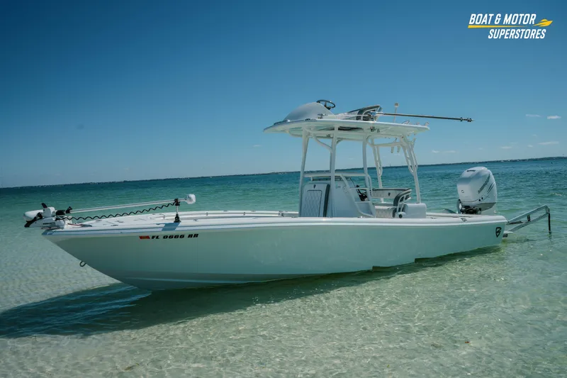 The Image of 2018 Barker Boatworks 26 Open in clear blue waters, showcasing sleek design and modern features. - 0