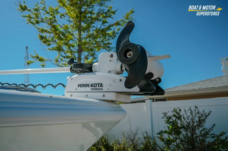 Slide: The Image of Minn Kota Terrova trolling motor on 2018 Barker Boatworks 26 Open, sunny day backdrop. - 10