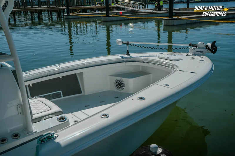Slide: The Image of 2018 Barker Boatworks 26 Open at dock, showcasing sleek design and spacious deck. - 22
