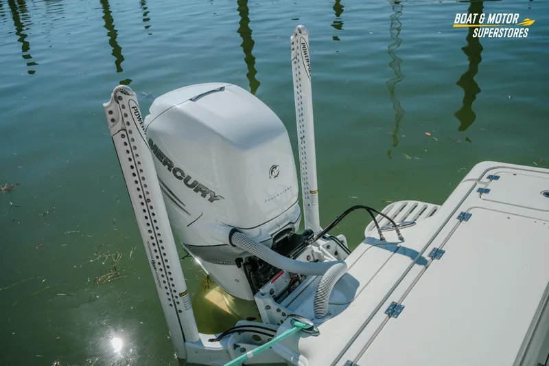 Slide: The Image of 2018 Barker Boatworks 26 Open with Mercury engine and Power-Pole anchors on water. - 29