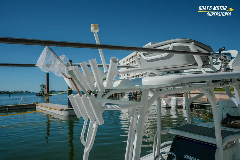 Slide: The Image of 2018 Barker Boatworks 26 Open with fishing gear, docked at marina. - 30