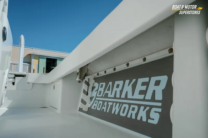 Slide: The Image of 2018 Barker Boatworks 26 Open interior detail with logo, showcasing sleek design. - 36