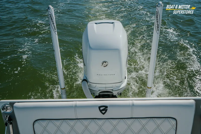 Slide: The Image of 2018 Barker Boatworks 26 Open with Mercury FourStroke engine on water. - 42