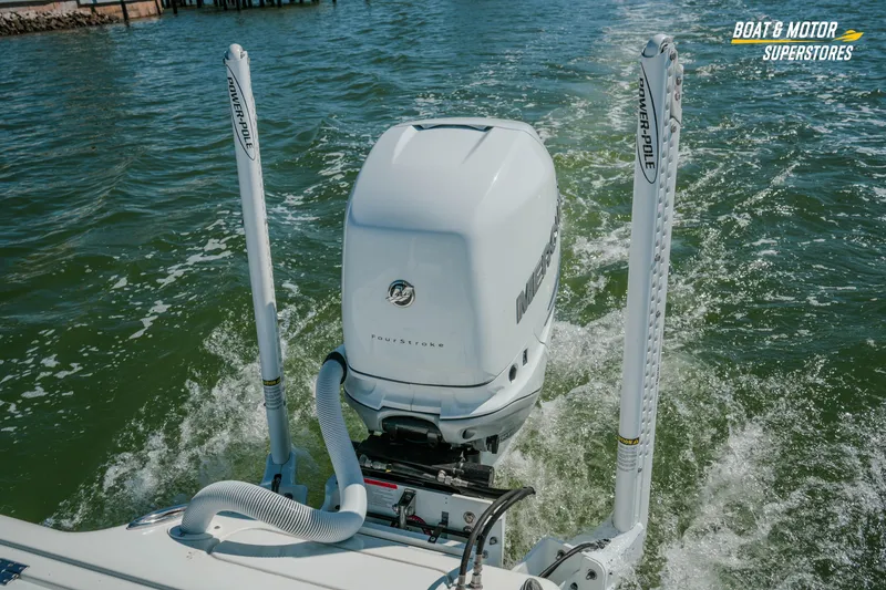 Slide: The Image of 2018 Barker Boatworks 26 Open with Mercury outboard motor and Power-Pole anchors on water. - 43
