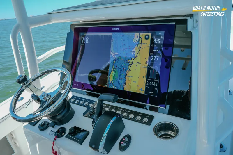 Slide: The Image of Helm of 2018 Barker Boatworks 26 Open with navigation display and controls. - 48
