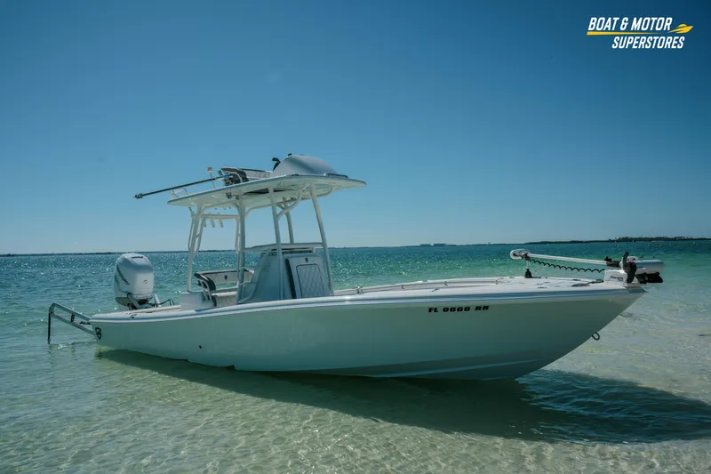 Slide: The Image of 2018 Barker Boatworks 26 Open in shallow water, clear sky, and calm sea. - 50