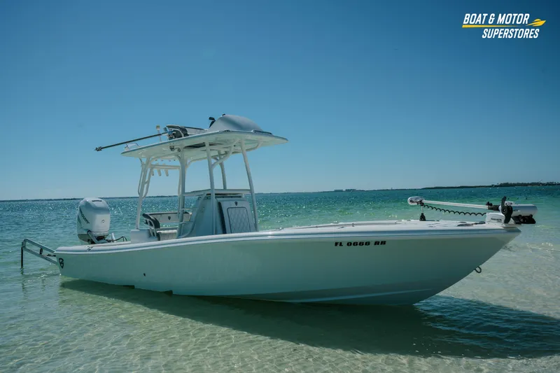 Slide: The Image of 2018 Barker Boatworks 26 Open in shallow water, clear sky, and calm sea. - 51