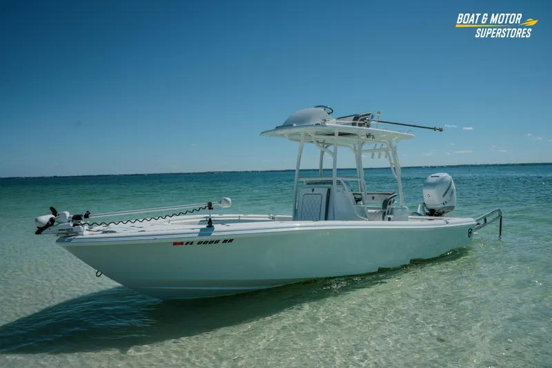 Slide: The Image of 2018 Barker Boatworks 26 Open in clear blue waters, showcased by Boat & Motor Superstores. - 56