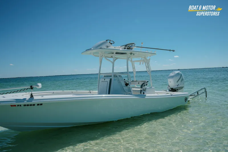 Slide: The Image of 2018 Barker Boatworks 26 Open in clear waters, showcasing sleek design and modern features. - 63