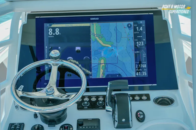 Slide: The Image of 2018 Barker Boatworks 26 Open helm with Simrad navigation display. - 71
