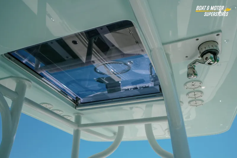 Slide: The Image of 2018 Barker Boatworks 26 Open T-top with hatch and controls, viewed from below. - 75
