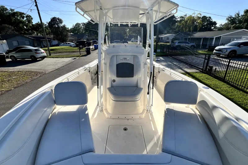Slide: The Image of 2021 Cobia 240 Center Console boat with spacious seating and sleek design. - 121