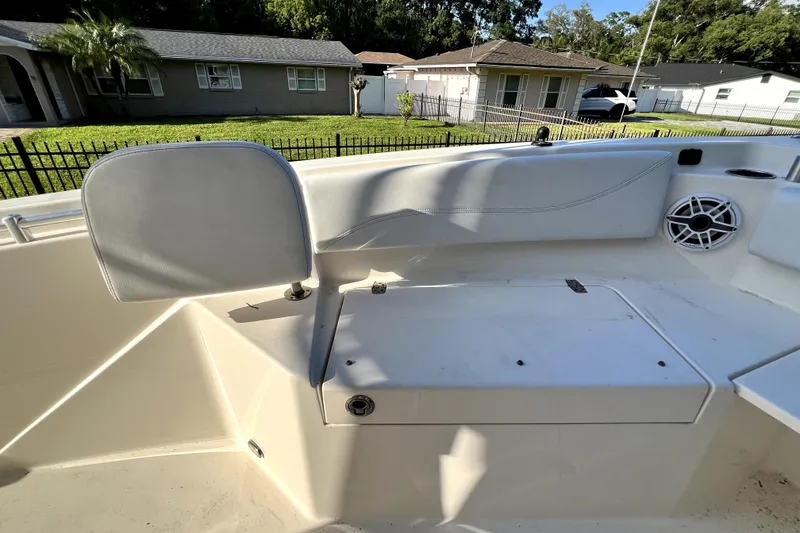 Slide: The Image of 2021 Cobia 240 Center Console boat interior with seating and speaker detail. - 130