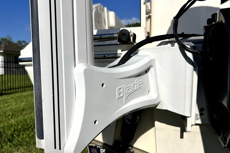 Slide: The Image of Close-up of a 2021 Cobia 240 Center Console boat component with "Blade" branding. - 21