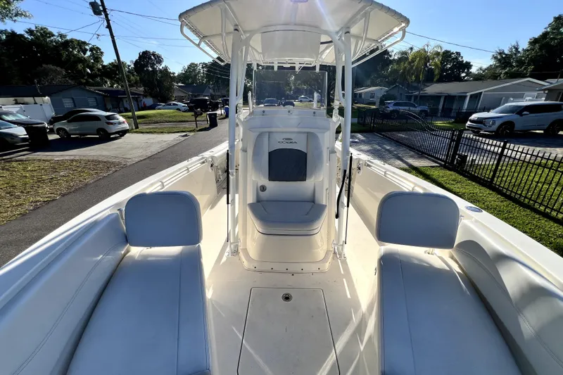 Slide: The Image of 2021 Cobia 240 Center Console boat with spacious seating and sleek design. - 78