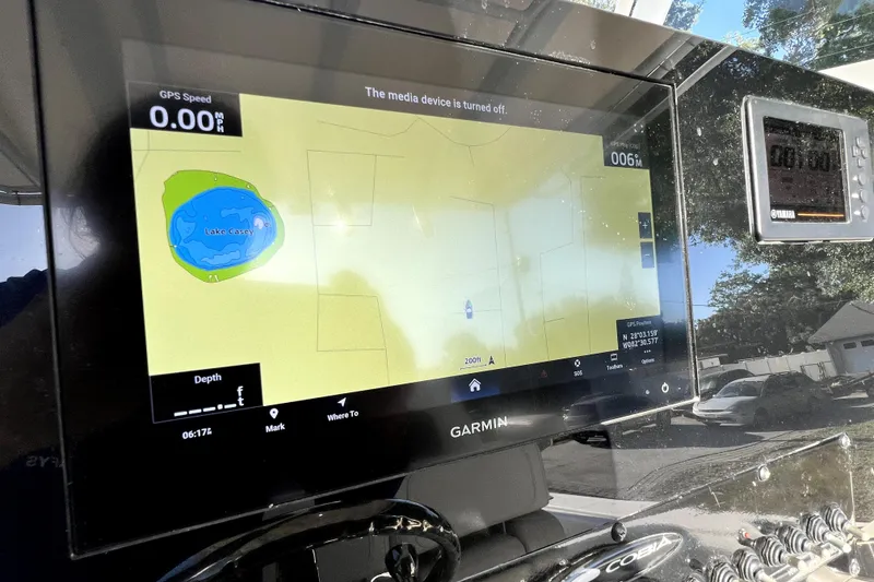 Slide: The Image of Garmin GPS display on 2021 Cobia 240 Center Console, showing Lake Casey map. - 99