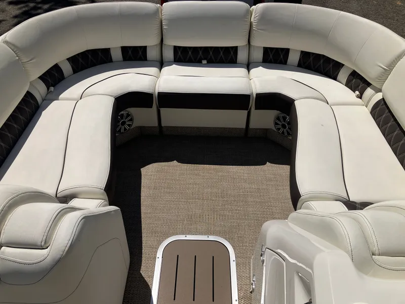 Slide: The Image of Interior of a 2019 Bennington 23 QLC pontoon boat with luxurious seating. - 17