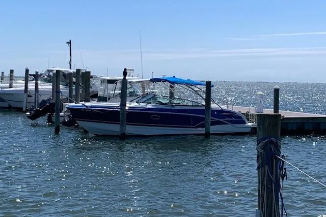 Slide: The Image of 2016 Formula 290 Bowrider docked at marina on a sunny day. - 5