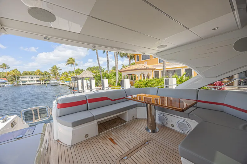 Slide: The Image of Luxurious Sunseeker Predator 60 EVO yacht interior, featuring elegant seating and waterfront view. - 21