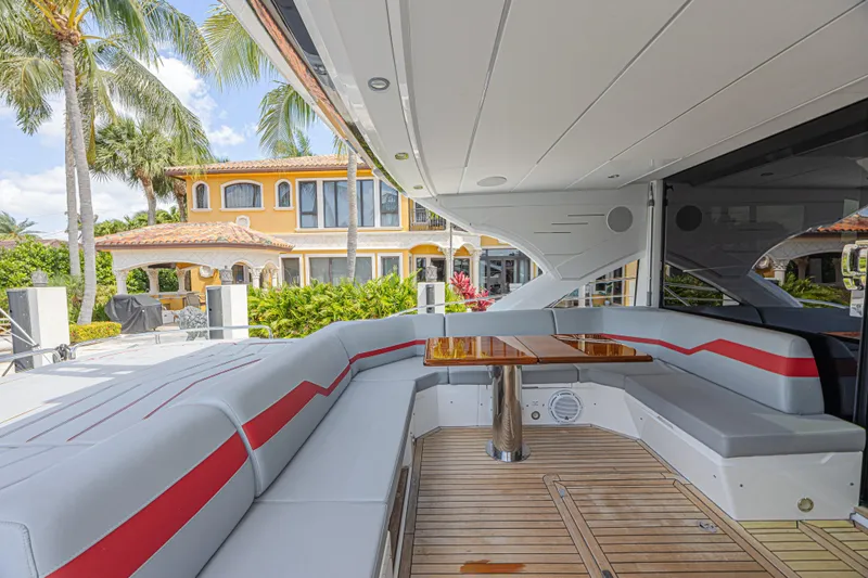 Slide: The Image of Luxurious Sunseeker Predator 60 EVO yacht interior with elegant seating and wooden table, 2021 model. - 25