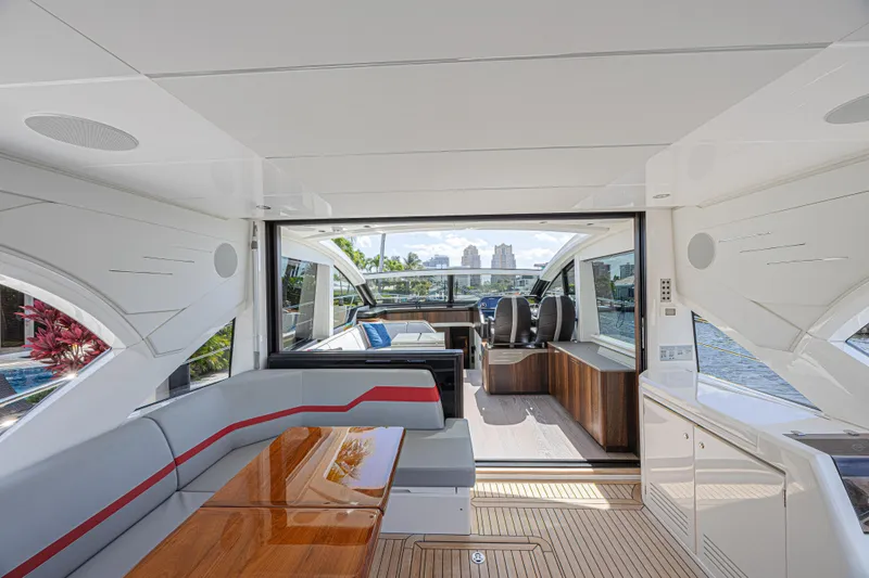 Slide: The Image of Luxurious interior of 2021 Sunseeker Predator 60 EVO yacht with modern seating and sleek design. - 26