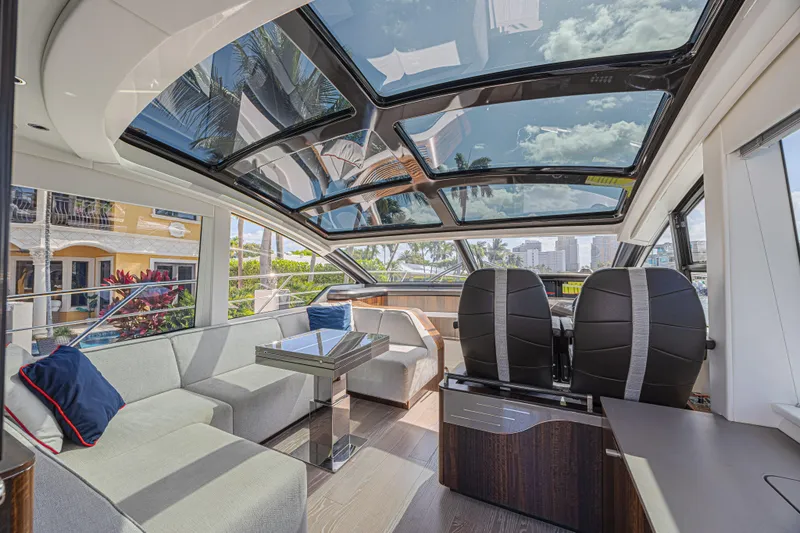 Slide: The Image of Luxurious interior of 2021 Sunseeker Predator 60 EVO yacht with panoramic glass roof. - 31