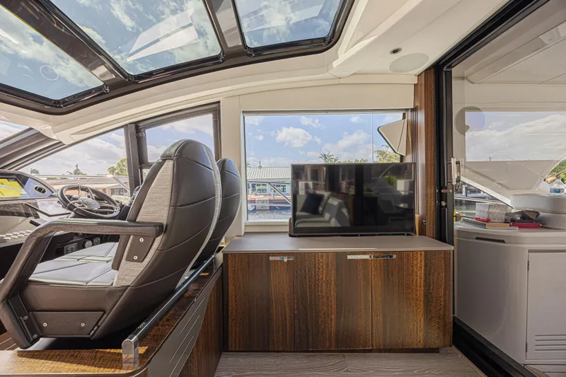 Slide: The Image of Interior of 2021 Sunseeker Predator 60 EVO yacht with luxurious seating and modern amenities. - 38