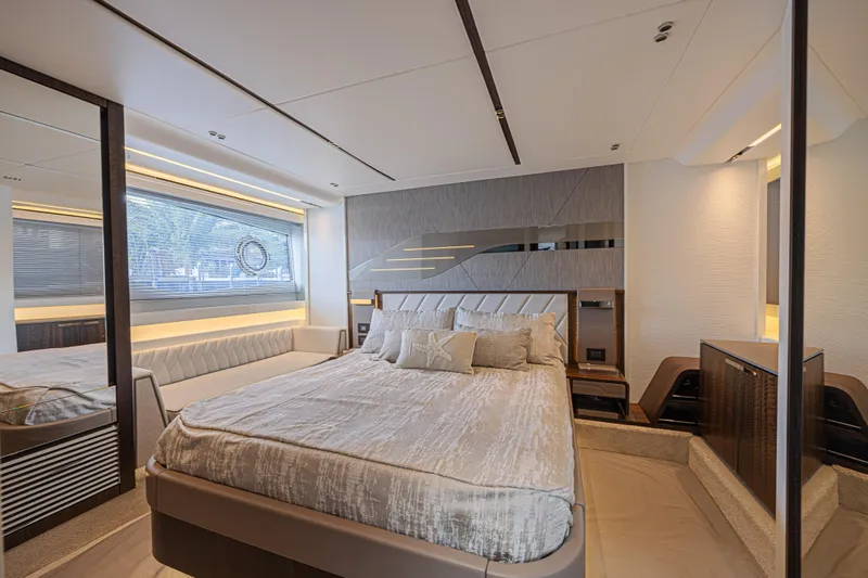Slide: The Image of Luxurious bedroom interior of 2021 Sunseeker Predator 60 EVO yacht, featuring modern design. - 45
