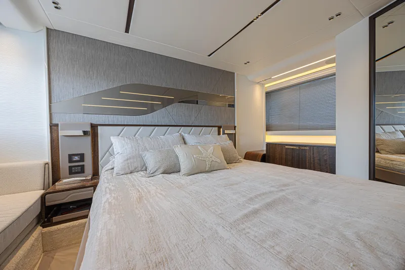 Slide: The Image of Luxurious bedroom interior of 2021 Sunseeker Predator 60 EVO yacht, featuring modern design elements. - 46