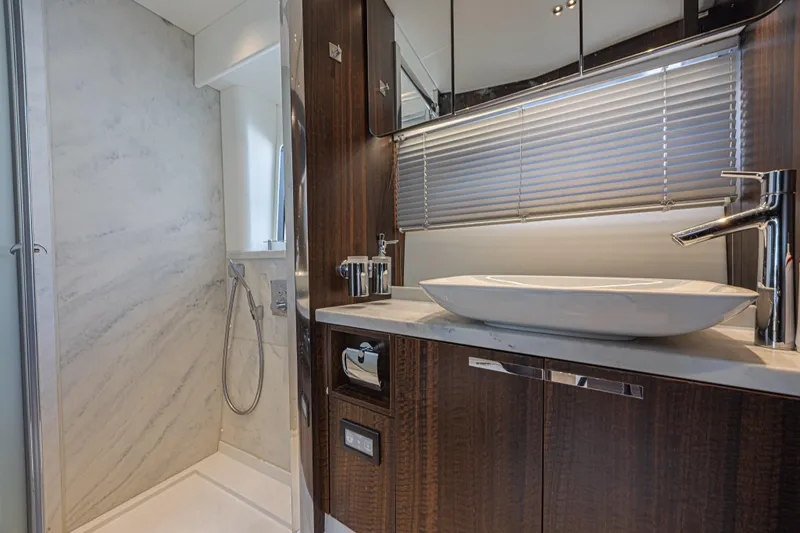 Slide: The Image of Luxurious bathroom in 2021 Sunseeker Predator 60 EVO yacht with modern fixtures. - 51