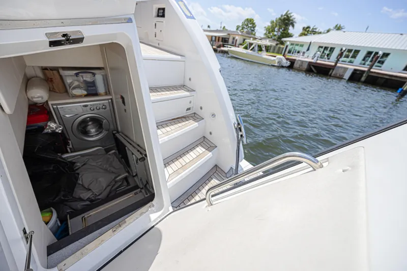 Slide: The Image of Laundry area on 2021 Sunseeker Predator 60 EVO yacht, dockside view. - 54