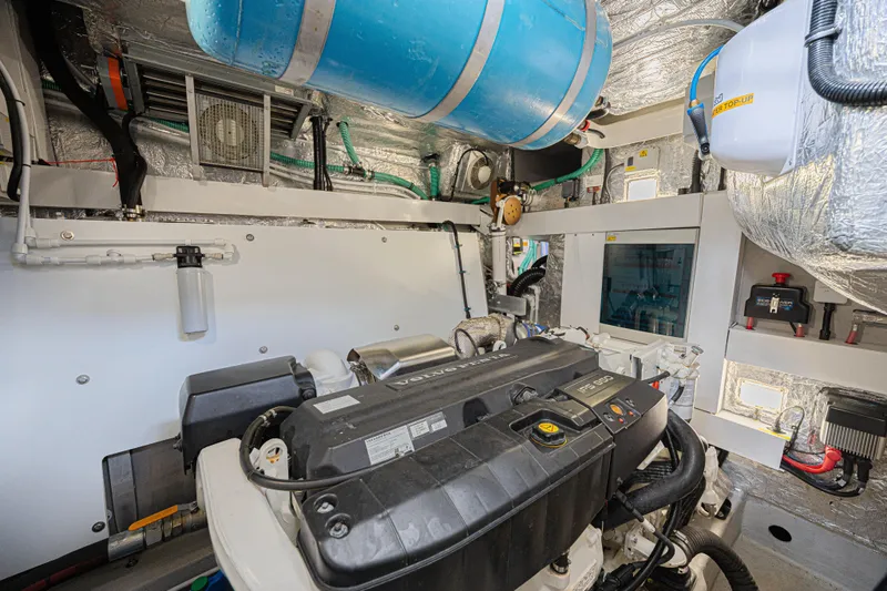 Slide: The Image of Engine room of 2021 Sunseeker Predator 60 EVO yacht, featuring Volvo Penta engine. - 56