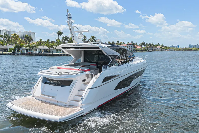 Slide: The Image of 2021 Sunseeker Predator 60 EVO yacht cruising on a sunny day. - 6