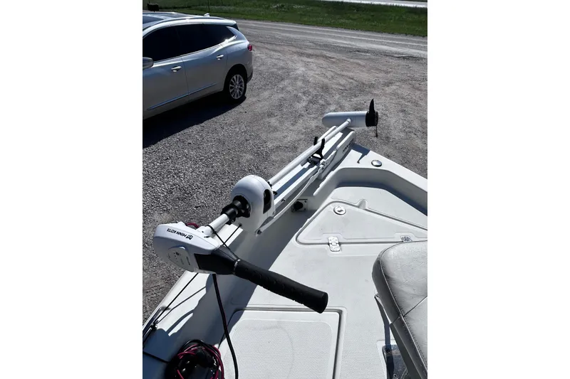 Slide: The Image of 2016 NauticStar 1810 NauticBay boat with trolling motor in parking lot. - 5