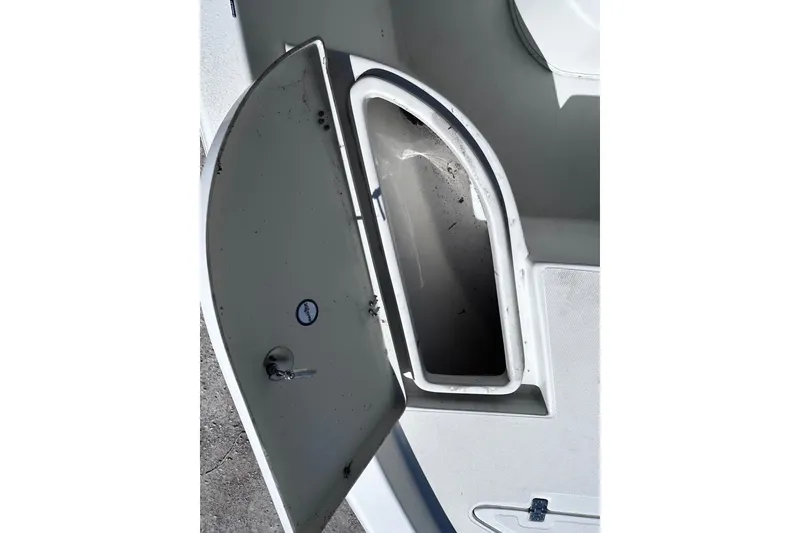 Slide: The Image of Open storage compartment on a 2016 NauticStar 1810 NauticBay boat. - 7