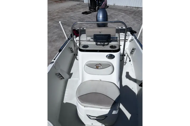 Slide: The Image of 2016 NauticStar 1810 NauticBay boat interior with console and seating. - 9