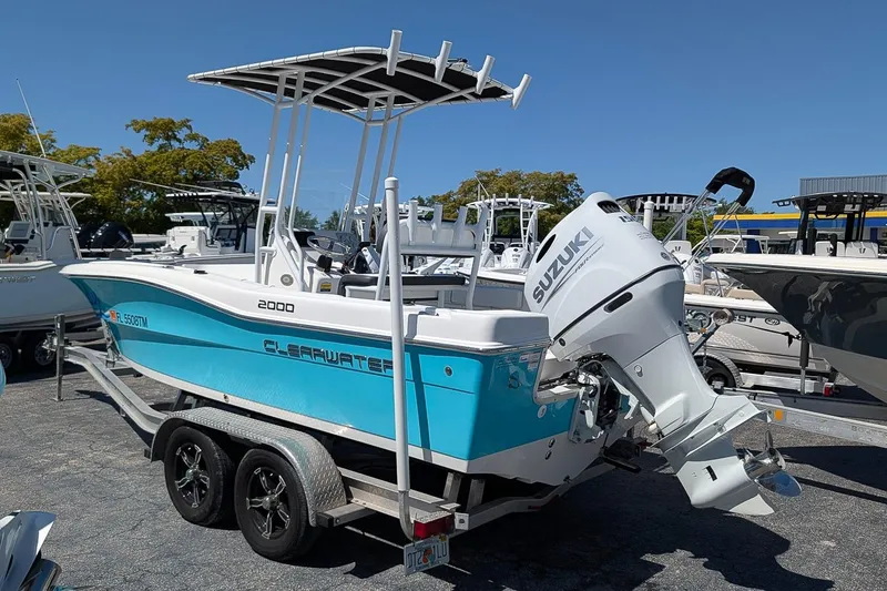 Slide: The Image of 2022 Clearwater 2000 Center Console boat with Suzuki engine on trailer. - 3