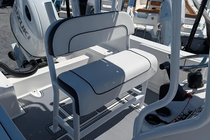 Slide: The Image of 2022 Clearwater 2000 Center Console boat interior with seating and controls. - 8