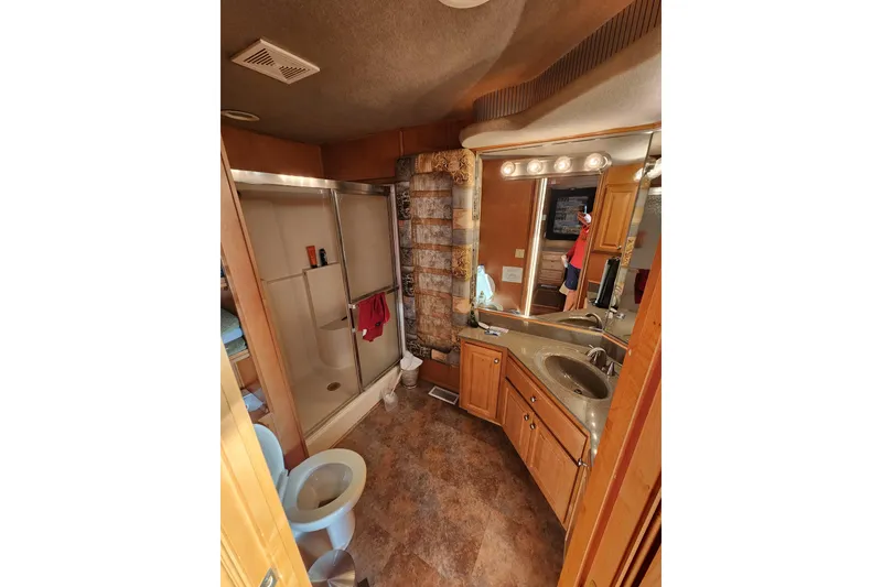 Slide: The Image of Luxurious bathroom in 2000 Sharpe 85 model houseboat with shower and vanity. - 31