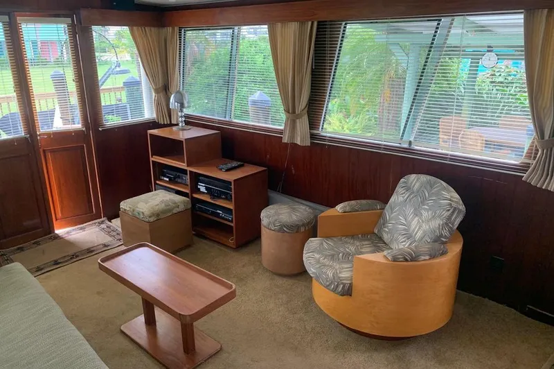 Slide: The Image of Interior of a 1985 Gulfstar MK2 with cozy seating area. - 22