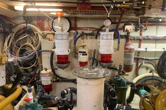 Slide: The Image of Engine room of a 1985 Gulfstar MK2 with technical components. - 27