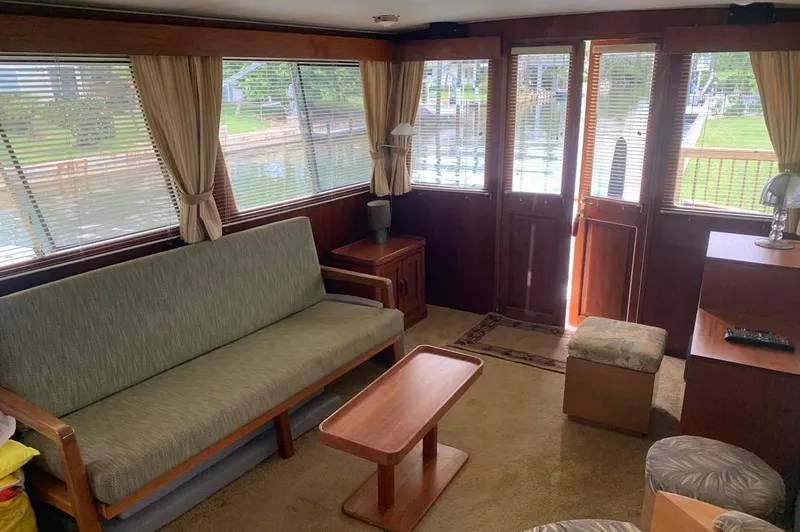 Slide: The Image of Interior of a 1985 Gulfstar MK2 yacht with sofa and wooden furniture. - 36