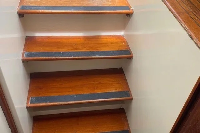 Slide: The Image of Wooden stairs on 1985 Gulfstar MK2 boat. - 37