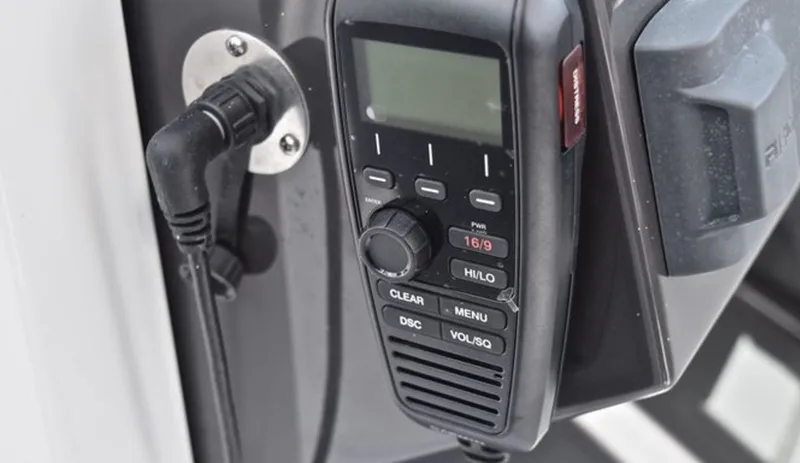 Slide: The Image of Close-up of a radio device on a 2019 Blackfin 272 DC boat. - 13