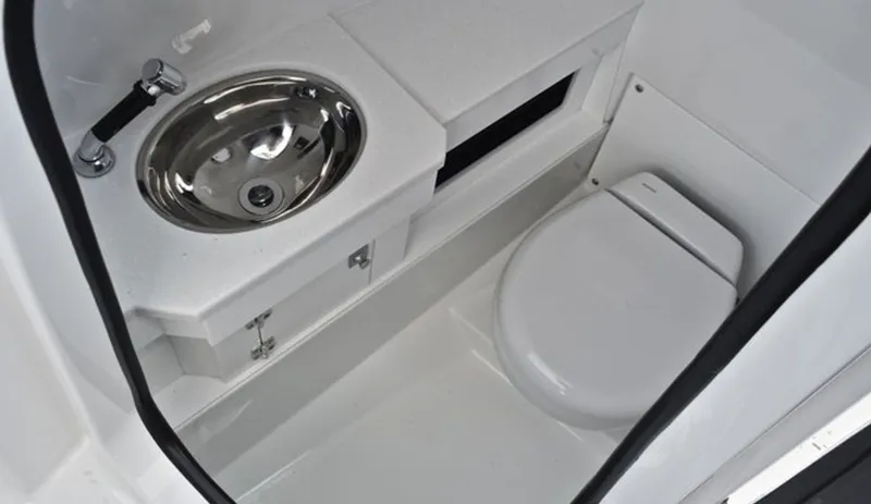 Slide: The Image of Interior of 2019 Blackfin 272 DC with sink and toilet. - 19
