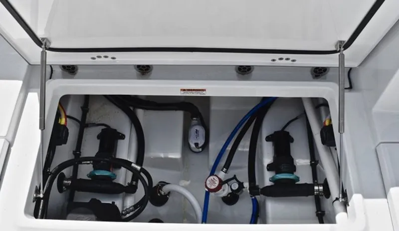 Slide: The Image of Interior view of a 2019 Blackfin 272 DC boat engine compartment. - 23