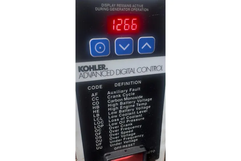 Slide: The Image of Kohler digital control panel displaying error codes on a 2009 Sea Ray Sundancer 350. - 20