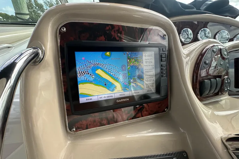 Slide: The Image of Garmin navigation system on 2004 Sea Ray 340 Sundancer boat dashboard, displaying nautical map. - 30