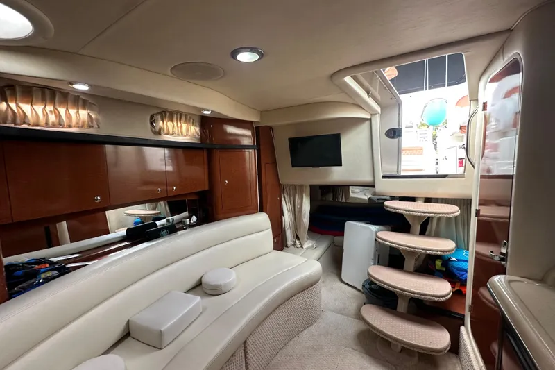 Slide: The Image of Luxurious interior of 2004 Sea Ray 340 Sundancer yacht with elegant seating and modern amenities. - 35