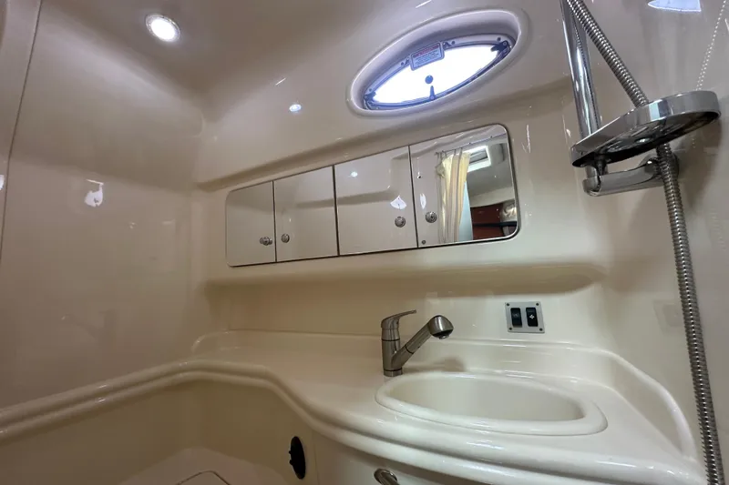 Slide: The Image of Luxurious bathroom interior of 2004 Sea Ray 340 Sundancer yacht with modern fixtures. - 53